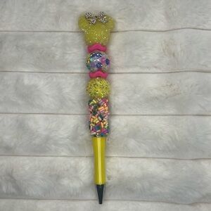Glittery Yellow Bow Pen with Colorful Accents
